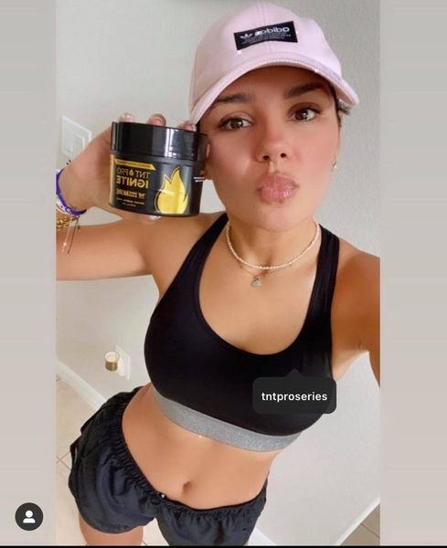 Ericka showing TNT Pro Ignite sweat cream